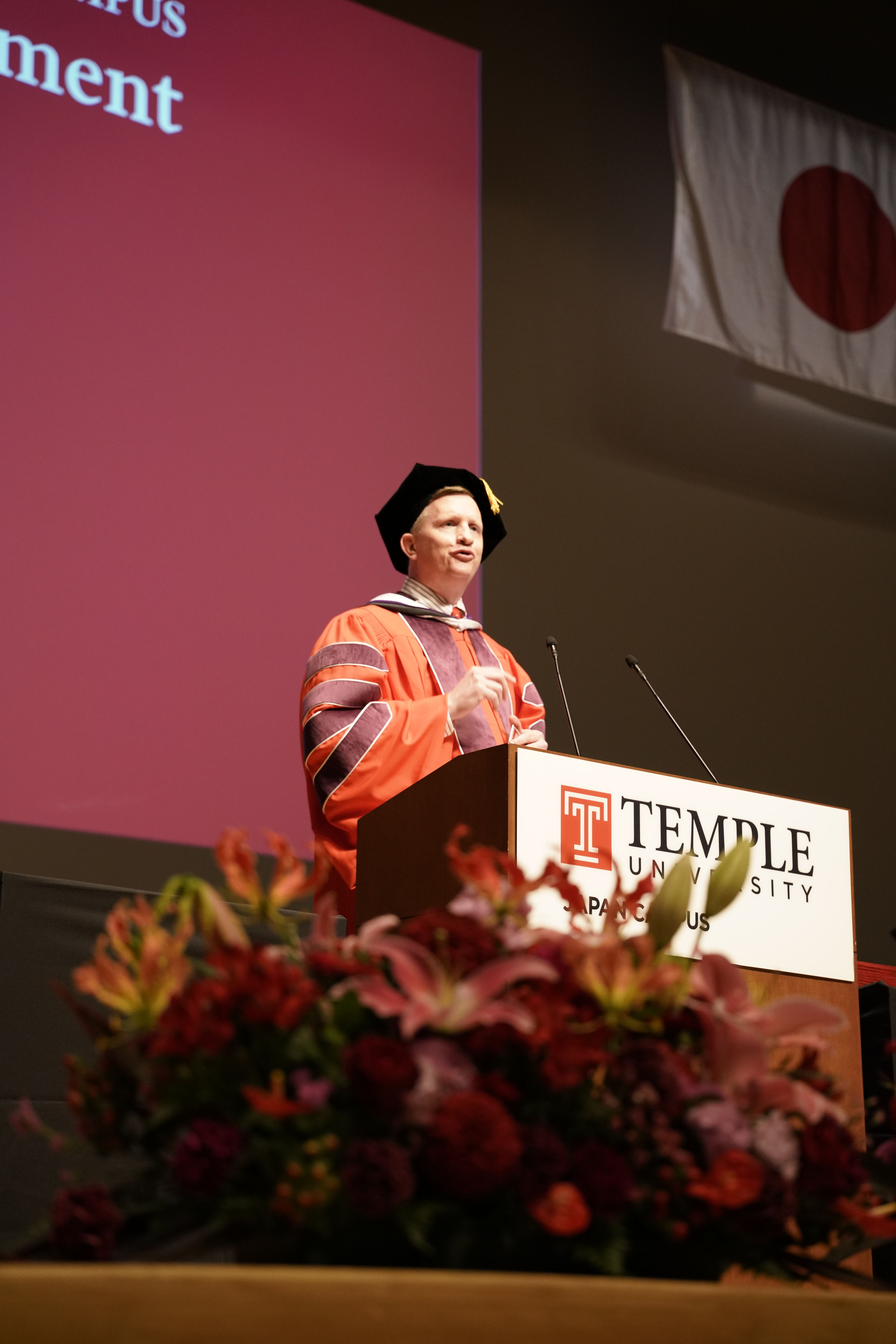 TUJ Dean, Matthew Wilson giving a speech